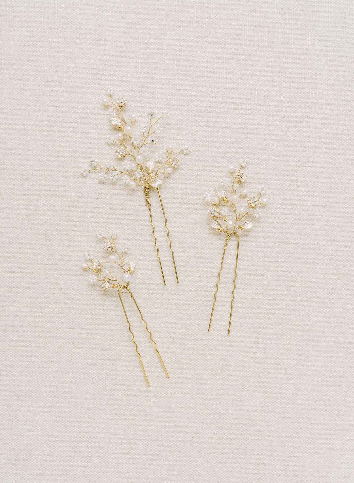 "dainty bridal pearl and crystal, blossom, hair pin set by twigs and honey bhldn"