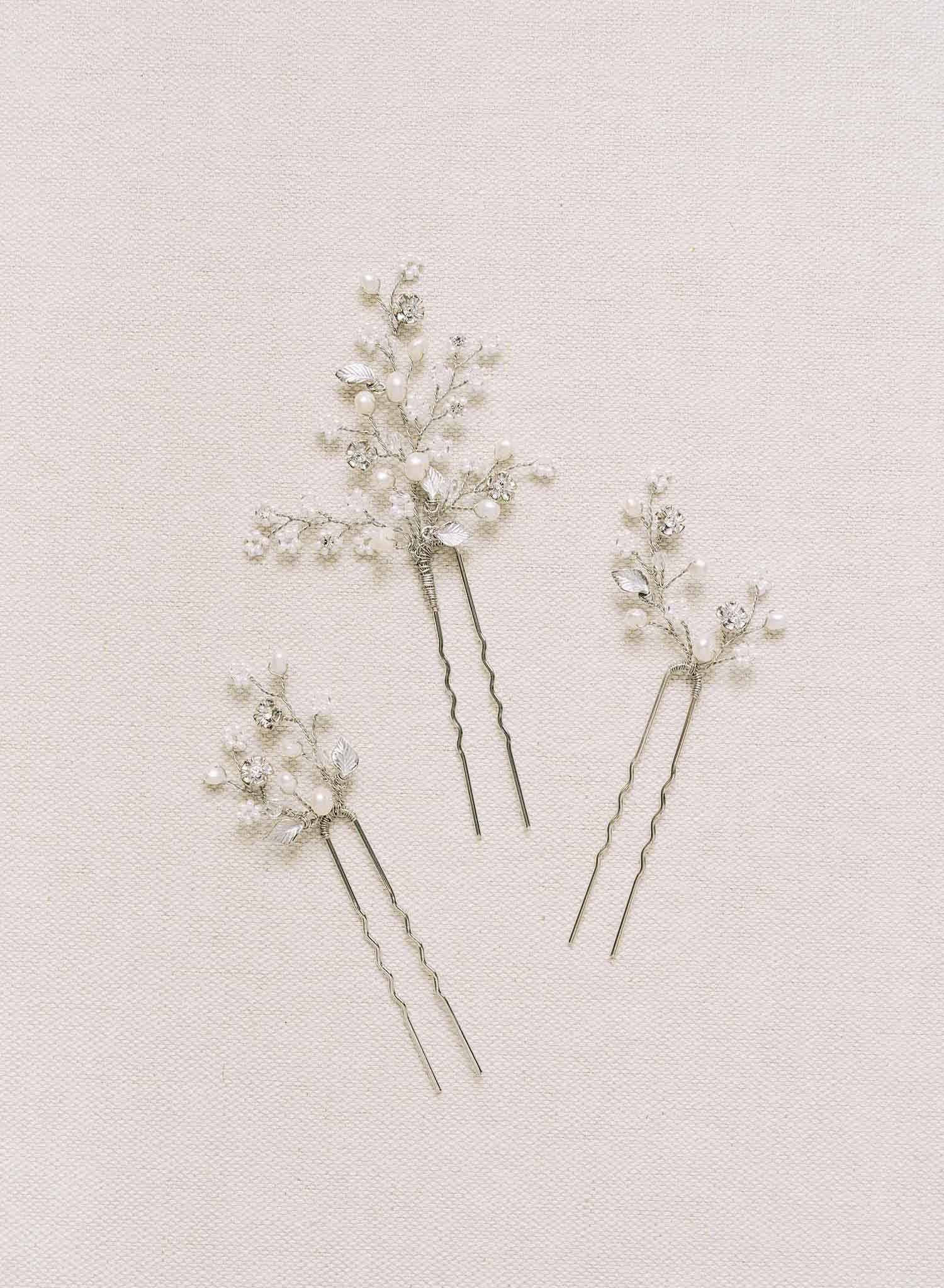 "dainty bridal pearl and crystal, blossom, hair pin set by twigs and honey bhldn"