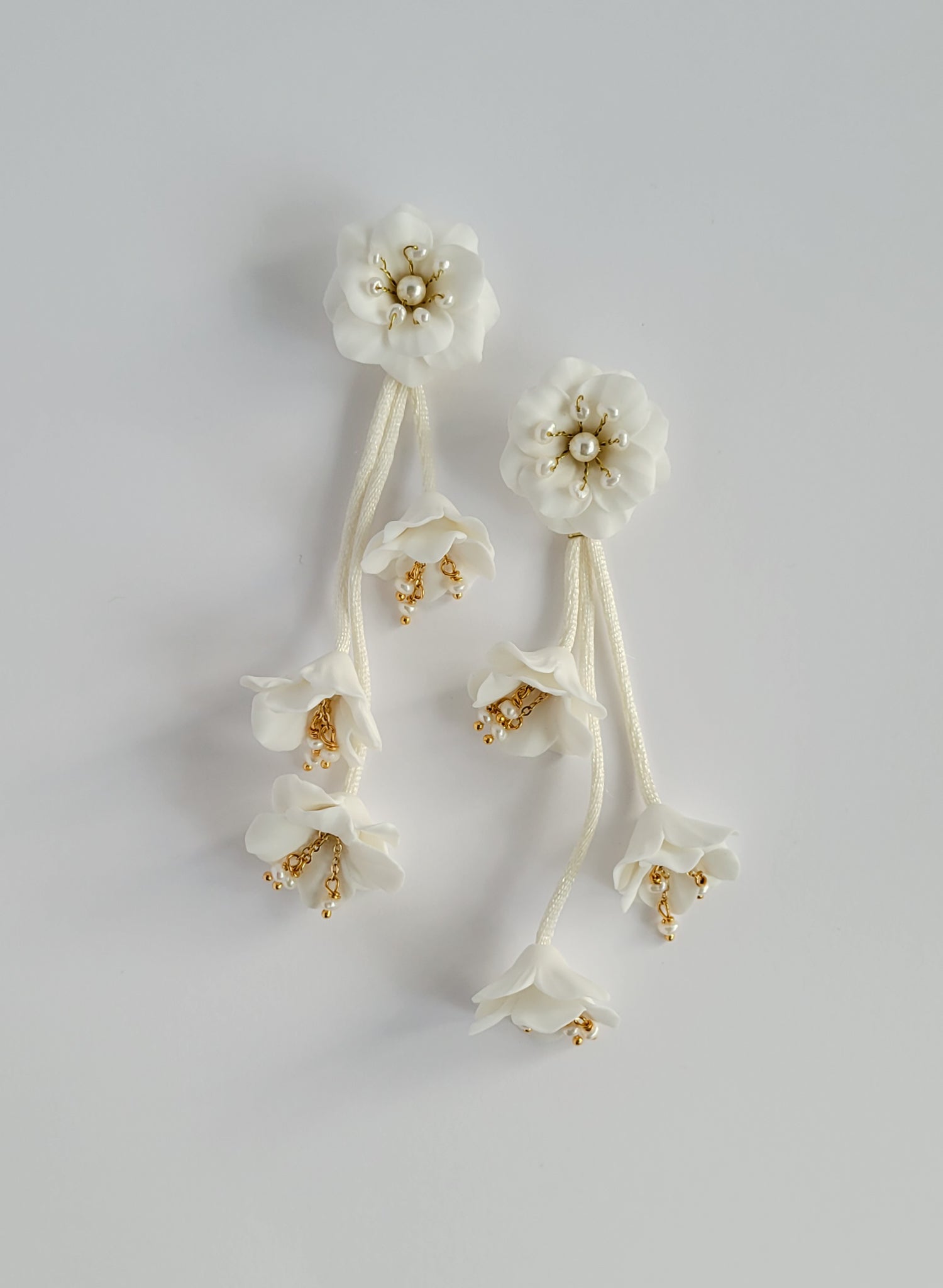 Dangling modern clay flowers bridal earrings - Style #2547